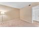 Well-lit bedroom with neutral colored walls and carpet at 750 E Northern Ave # 1134, Phoenix, AZ 85020