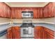 Stainless steel appliances and wood cabinets at 750 E Northern Ave # 1134, Phoenix, AZ 85020