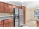 Modern kitchen features stainless steel appliances and ample cabinetry at 750 E Northern Ave # 1134, Phoenix, AZ 85020