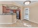 Kitchen with breakfast bar and access to patio at 750 E Northern Ave # 1134, Phoenix, AZ 85020