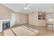 Living room, fireplace, kitchen, and access to patio at 750 E Northern Ave # 1134, Phoenix, AZ 85020