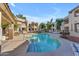 Community pool with surrounding lounge chairs at 750 E Northern Ave # 1134, Phoenix, AZ 85020