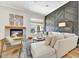 Light-filled living room with a statement wall and cozy seating at 8027 E Juan Tabo Rd, Scottsdale, AZ 85255