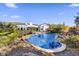 Inviting kidney shaped pool with a rock waterfall feature at 8027 E Juan Tabo Rd, Scottsdale, AZ 85255