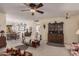 Spacious living room with a dining area and hardwood floors at 9245 N 109Th Dr, Sun City, AZ 85351