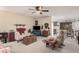 Cozy living room featuring a comfortable couch and a charming country decor at 9245 N 109Th Dr, Sun City, AZ 85351