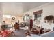 Bright sunroom featuring ample seating and a view at 9245 N 109Th Dr, Sun City, AZ 85351