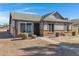 Single story home with brick and siding exterior, landscaping, and a walkway at 1055 N Recker Rd # 1215, Mesa, AZ 85205