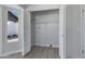 Well-lit laundry room with built-in shelving and window at 1055 N Recker Rd # 1215, Mesa, AZ 85205