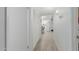 Hallway with built-in storage and wood floors at 1075 E Chandler Blvd # 120, Chandler, AZ 85225