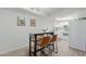 View of kitchen with white cabinets and appliances at 1075 E Chandler Blvd # 120, Chandler, AZ 85225