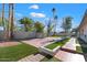 Large backyard with artificial turf, patio, and basketball court at 11209 N 40Th St, Phoenix, AZ 85028