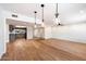 Open concept dining area with hardwood floors and pendant lighting at 11209 N 40Th St, Phoenix, AZ 85028