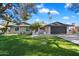 Single story home with landscaped lawn, driveway, and attached garage at 11209 N 40Th St, Phoenix, AZ 85028