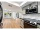 Modern kitchen features stainless steel appliances and white subway tile backsplash at 11209 N 40Th St, Phoenix, AZ 85028