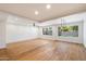 Spacious living room featuring hardwood floors and large windows at 11209 N 40Th St, Phoenix, AZ 85028