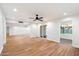 Bright and airy living room with hardwood floors and ceiling fan at 11209 N 40Th St, Phoenix, AZ 85028