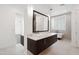 Bathroom with floating vanity and walk-in shower at 11243 E Flintlock Dr, Chandler, AZ 85249