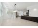 Spacious dining area with modern light fixture and tile floors at 11243 E Flintlock Dr, Chandler, AZ 85249