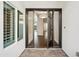 Bright and airy entryway with a sleek modern door at 11243 E Flintlock Dr, Chandler, AZ 85249