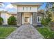 Modern entryway with brick pillars and a spacious walkway at 11243 E Flintlock Dr, Chandler, AZ 85249