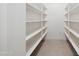 Walk in pantry with ample shelving at 11243 E Flintlock Dr, Chandler, AZ 85249