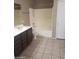 Bathroom with shower/tub combo and tile floor at 11432 E Quicksilver Ave, Mesa, AZ 85212