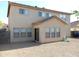 Back of the house showing additional ground level space and a patio at 11432 E Quicksilver Ave, Mesa, AZ 85212