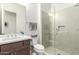 Modern bathroom with a large shower and vanity at 12411 E Troon Vista Dr, Scottsdale, AZ 85255