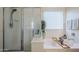 Bathroom with shower and bathtub at 1253 E Debbie Dr, San Tan Valley, AZ 85140