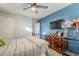 Bedroom with blue accent wall and ample closet space at 1253 E Debbie Dr, San Tan Valley, AZ 85140