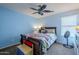 Bright bedroom with a double bed and ceiling fan at 1253 E Debbie Dr, San Tan Valley, AZ 85140