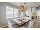 Bright dining area with farmhouse style table at 1253 E Debbie Dr, San Tan Valley, AZ 85140