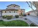 Two-story home with landscaped front yard and a long driveway at 1253 E Debbie Dr, San Tan Valley, AZ 85140