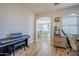 Home office with piano and view of dining area at 1253 E Debbie Dr, San Tan Valley, AZ 85140