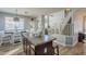 Kitchen island with view of dining area and staircase at 1253 E Debbie Dr, San Tan Valley, AZ 85140