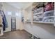 Spacious walk-in closet with shelving and drawers at 1253 E Debbie Dr, San Tan Valley, AZ 85140