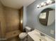 Clean bathroom with shower, toilet, and vanity at 13428 N 36Th Pl, Phoenix, AZ 85032