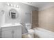 Clean bathroom with a bathtub and updated vanity at 13428 N 36Th Pl, Phoenix, AZ 85032