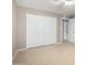 Spacious bedroom with large closet and tile flooring at 13428 N 36Th Pl, Phoenix, AZ 85032