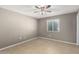 Bright bedroom with window blinds and ceiling fan at 13428 N 36Th Pl, Phoenix, AZ 85032