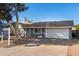 Single-story home with a two-car garage and pool at 13428 N 36Th Pl, Phoenix, AZ 85032