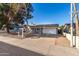 House exterior featuring a gray facade, driveway, and street view at 13428 N 36Th Pl, Phoenix, AZ 85032