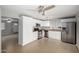 Modern kitchen with white cabinets and granite counters at 13428 N 36Th Pl, Phoenix, AZ 85032