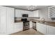 Well-equipped kitchen featuring stainless steel appliances at 13428 N 36Th Pl, Phoenix, AZ 85032