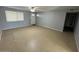 Spacious living room with tile flooring and neutral walls at 13428 N 36Th Pl, Phoenix, AZ 85032