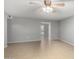 Living room with tile floors and view of backyard pool at 13428 N 36Th Pl, Phoenix, AZ 85032