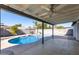 Relaxing covered patio overlooking the pool at 13428 N 36Th Pl, Phoenix, AZ 85032