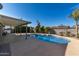 Relaxing kidney-shaped pool with patio and covered area at 13428 N 36Th Pl, Phoenix, AZ 85032