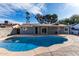 Inviting kidney-shaped pool in a sunny backyard at 13428 N 36Th Pl, Phoenix, AZ 85032